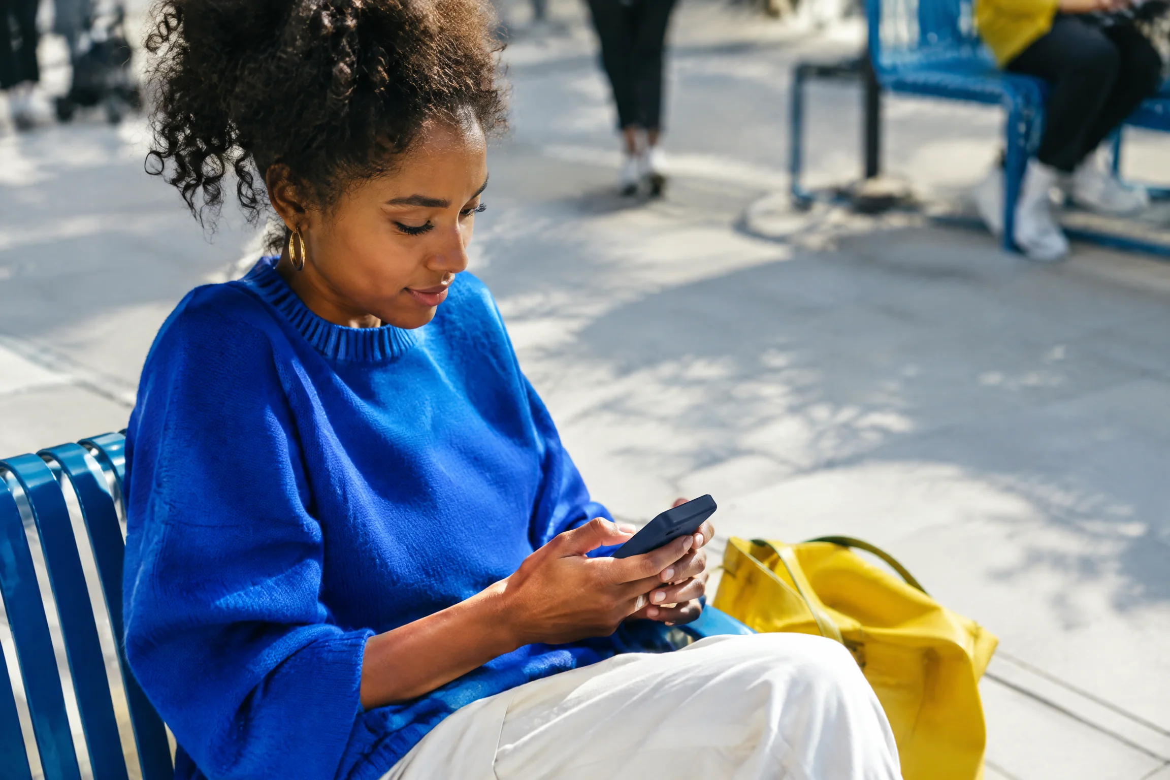 Person using a phone in public